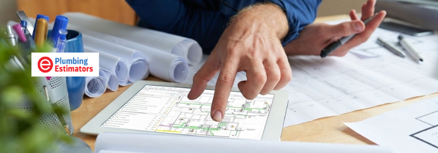 A drafting compass resting on complex hydraulic blueprints during a tender documentation review for plumbing estimates.