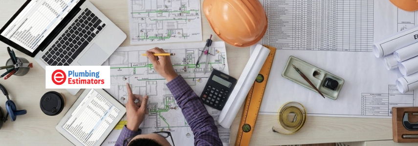Estimator conducting a scope review over hydraulic plans to improve plumbing estimating accuracy.